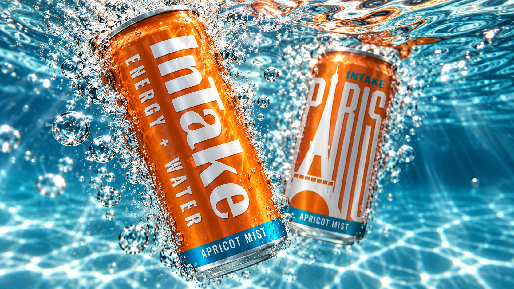 InTake Paris Apricot Mist — two cans splashing in water